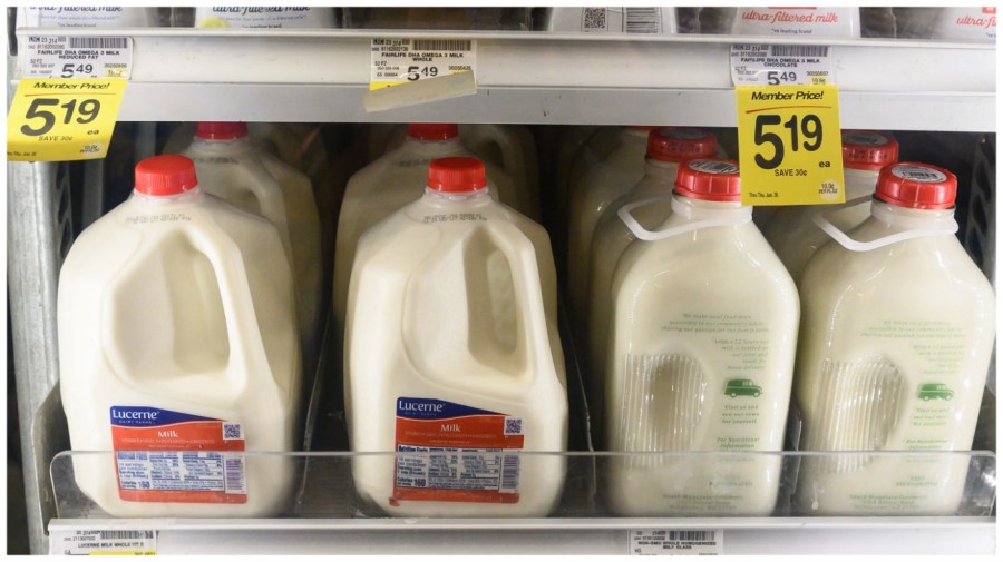 Milk prices are displayed in a supermarket in Washington, DC, on May 26, 2022. (Photo by Nicholas Kamm/AFP via Getty Images)