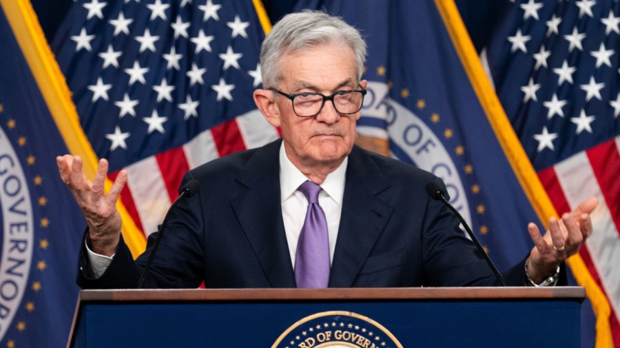 Jerome Powell speaks at a press conference.