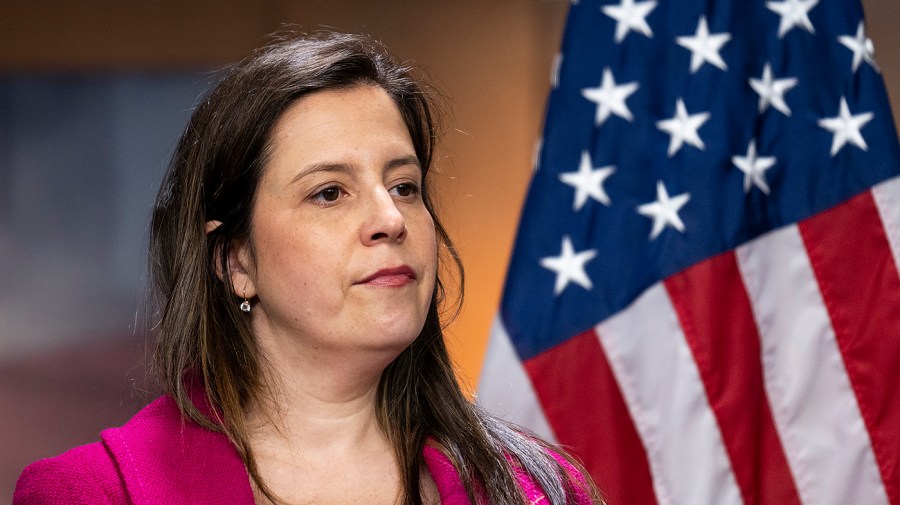 Representative Elise Stefanik looks out at the press.