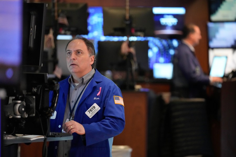 Traders work on the floor at the New York Stock Exchange in New York, Wednesday, May 1, 2024. (AP Photo/Seth Wenig)