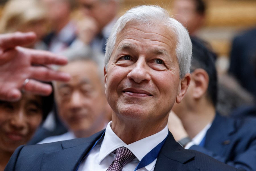 Chase CEO Jamie Dimon is seen in a crowd at an event.