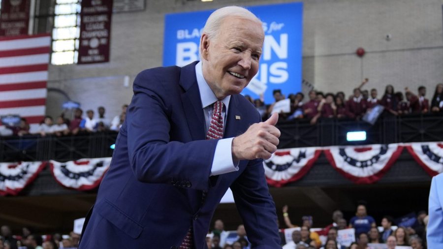 President Biden gestures a thumbs-up after speaking during a campaign event.