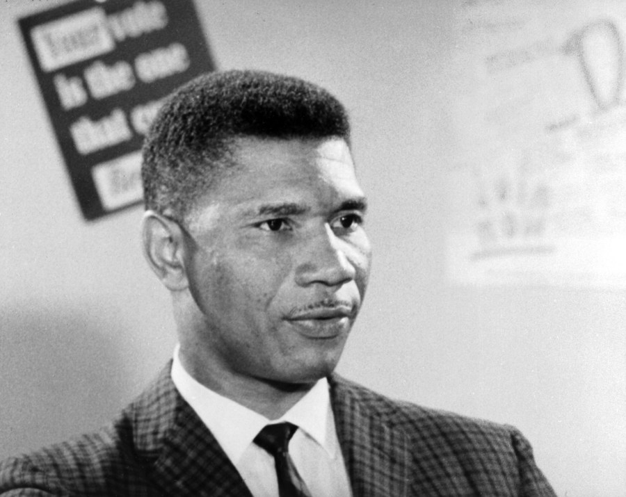 Medgar Evers is seen in a historical black-and-white photo from 1962.