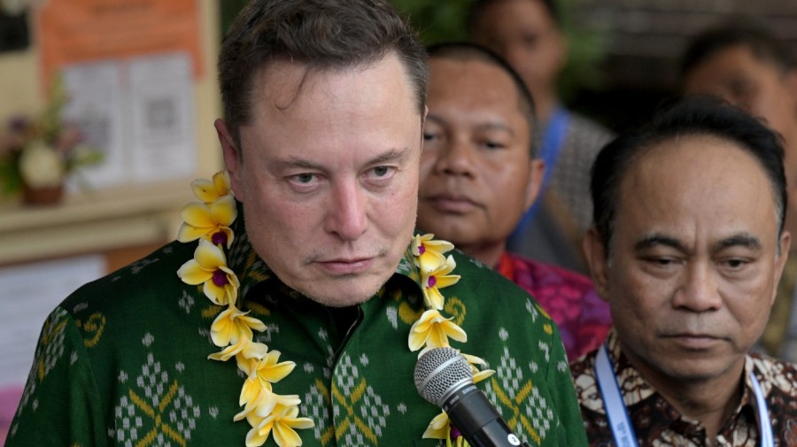 Tech billionaire Elon Musk (L) speaks during a ceremony held to inaugurate satellite unit Starlink at a community health center in Denpasar on Indonesia's resort island of Bali on May 19, 2024. Musk launched on May 19 his Starlink service on Indonesia's resort island of Bali as the country aims to extend internet to its remote areas. Millions of people in Indonesia, a vast archipelago of more than 17,000 islands, are not currently hooked up to reliable internet services. (Photo by SONNY TUMBELAKA / AFP) (Photo by SONNY TUMBELAKA/AFP via Getty Images)