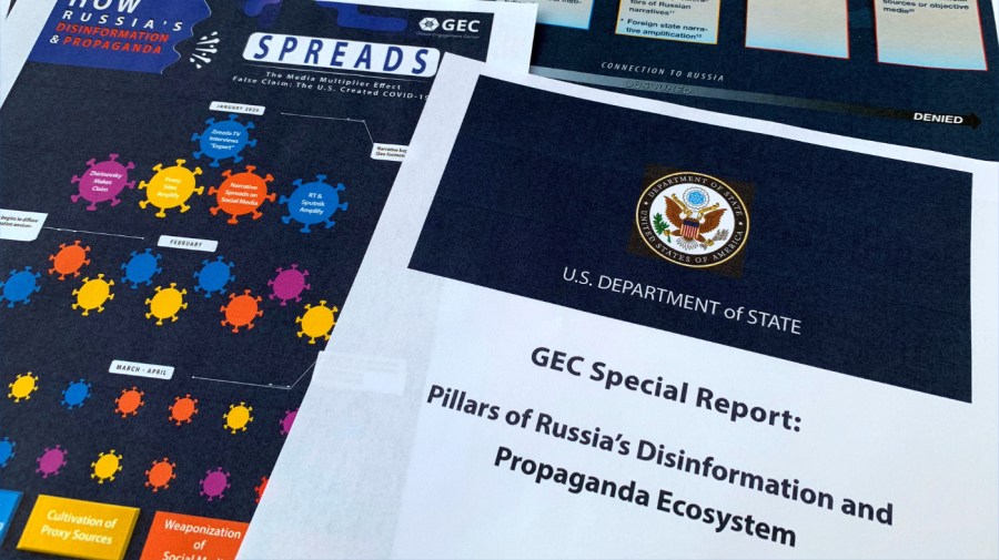 Pages from the U.S. State Department's Global Engagement Center report released on Aug. 5, 2020, are seen in this photo.