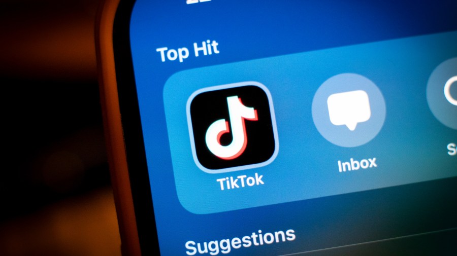 The TikTok app is seen on an iPhone screen.