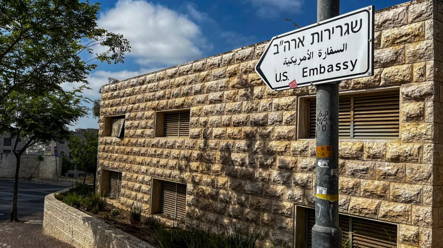 A road sign shows the way towards the US embassy in Jerusalem on April 19, 2024.