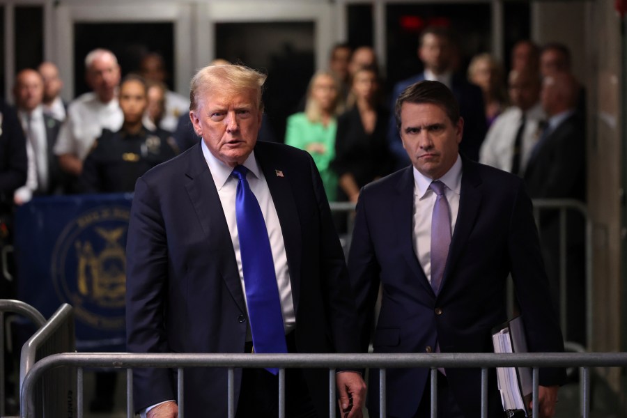 Former President Donald Trump approaches to speak to the media alongside his attorney Todd Blanche after the conclusion of his hush money trial in New York, Thursday, May 30, 2024. (Michael M. Santiago/Pool Photo via AP)