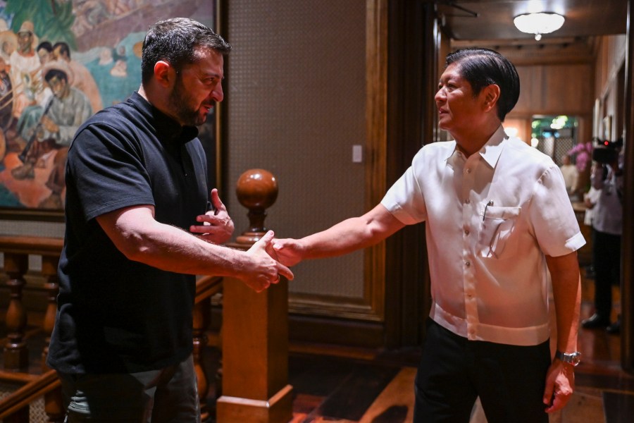 Ukraine's President Volodymyr Zelenskyy, left, meets Philippine President Ferdinand Marcos Jr. at the Malacanang presidential palace in Manila, Philippines on Monday June 3, 2024.(Jam Sta Rosa/Pool Photo via AP)