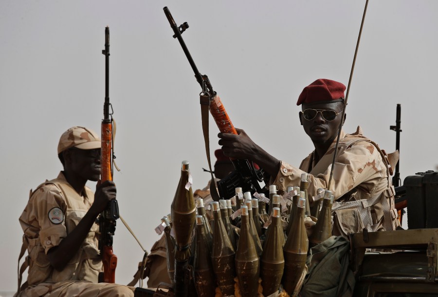 FILE - Sudanese soldiers from the Rapid Support Forces unit, led by Gen. Mohammed Hamdan Dagalo, the deputy head of the military council, secure the area where Dagalo attends a military-backed tribe's rally, in the East Nile province, Sudan, on June 22, 2019. The RSF, attacked the South Hospital in al-Fasher, the capital city of North Darfur province on Sunday, June 9, 2024 opening fire on medical staff and patients, Doctors Without Borders said in a statement. (AP Photo/Hussein Malla, File)