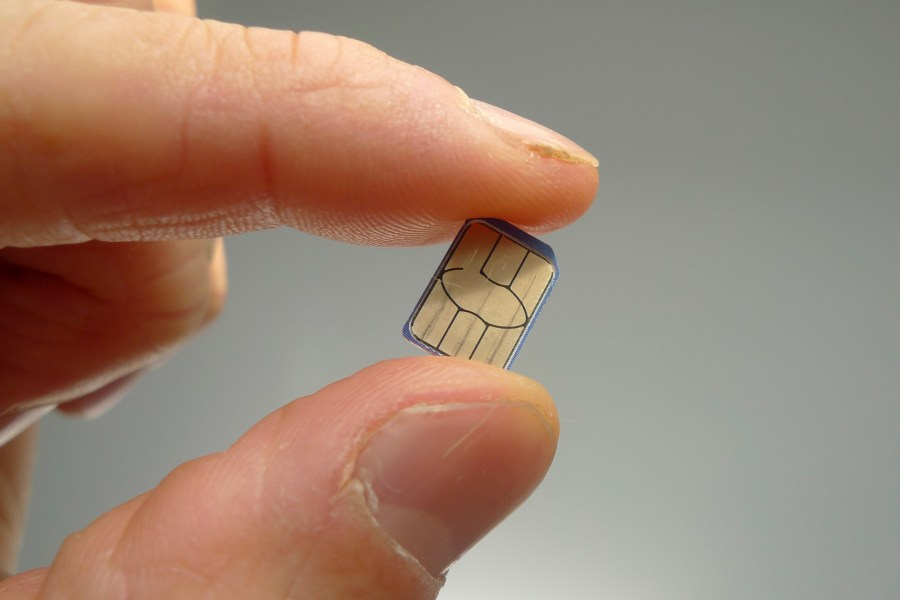 A SIM card is shown in this photo taken on Monday, June 10, 2024 in London. Physical SIM cards are going away, replaced by eSIMs which make switching cell carriers easier. AP Photo/Kelvin Chan)