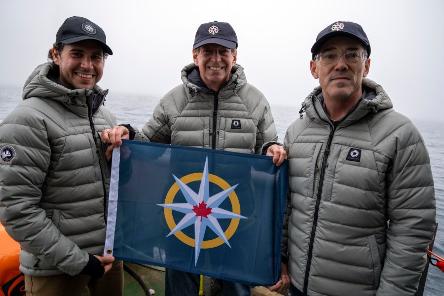 In this photo provided by Canadian Geographic shows Antoine Normandin, from left, Deputy Search Director, John Geiger, Expedition Leader and CEO, Royal Canadian Geographical Society and David Mearns, Search Director, Blue Water Recoveries Ltd. part of the team that located the missing Quest ship, in Labrador, Canada, Sunday, June 9, 2024. The wreck of the last ship belonging to Sir Ernest Shackleton, a famous Irish-born British explorer of Antarctica, has been found off the coast of Labrador in Canada, 62 years after it went missing. The wreck was found by an international team led by the Royal Canadian Geographical Society. (Jill Heinerth/Canadian Geographic via AP)