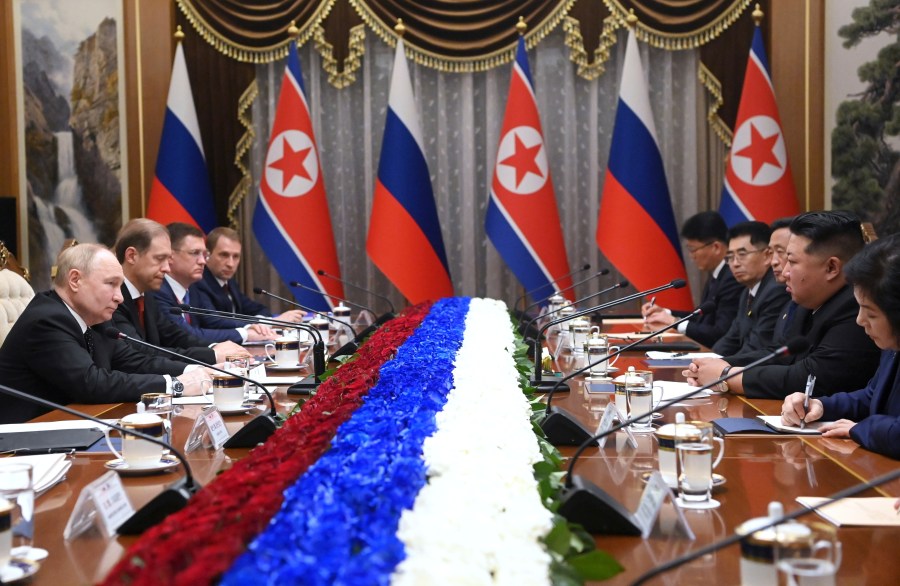 Russian President Vladimir Putin, left, and North Korea's leader Kim Jong Un, second right, attend the talks in Pyongyang, North Korea, Wednesday, June 19, 2024. (Kristina Kormilitsyna, Sputnik, Kremlin Pool Photo via AP)