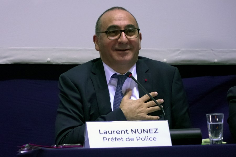 FILE - Paris police prefect Laurent Nunez reacts during a meeting with Parisians at a Paris town hall, Thursday, Feb.8, 2024. With just 35 days before the start of the Olympics, Paris police chief Laurent Nunez held a press conference on Friday, June 21, 2024, to address security concerns, notably about the unprecedented opening ceremony on the Seine river. (AP Photo/John Leicester, File)