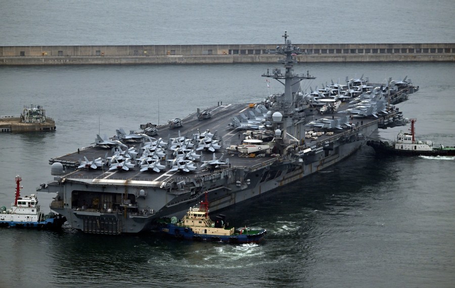 The Theodore Roosevelt (CVN 71), a nuclear-powered aircraft carrier is anchored in Busan, South Korea, Saturday, June 22, 2024. (Song Kyung-Seok/Pool Photo via AP)