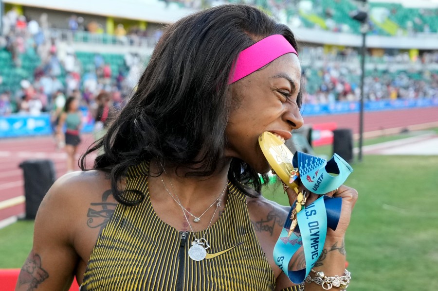 Sha'Carri Richardson celebrates her win in the wins women's 100-meter run final during the U.S. Track and Field Olympic Team Trials Saturday, June 22, 2024, in Eugene, Ore. (AP Photo/Charlie Neibergall)