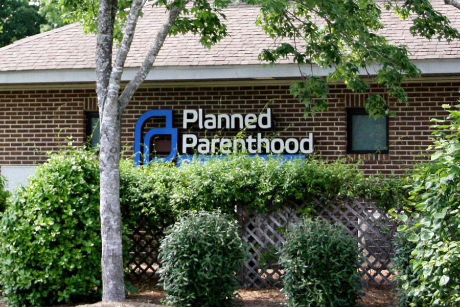 FILE - The Planned Parenthood Health Center located in Chapel Hill, N.C., is seen, May 3, 2024. Planned Parenthood will spend $40 million ahead of November's elections to bolster President Joe Biden and leading congressional Democrats. It will initially target eight states: Arizona, Georgia, Pennsylvania, Wisconsin, North Carolina, Montana, New Hampshire and New York. (AP Photo/Makiya Seminera, File)