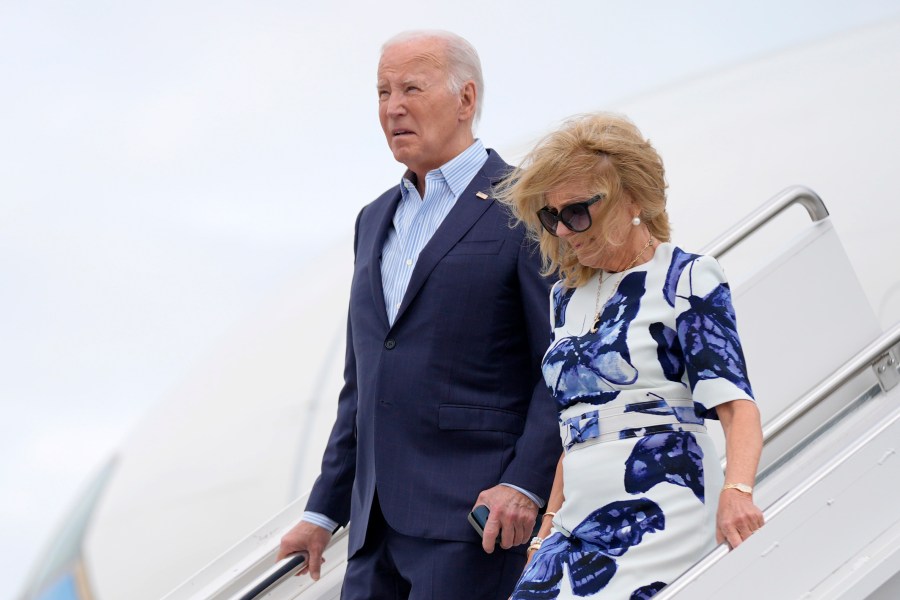 President Joe Biden, left, and first lady Jill Biden arrive at Francis S. Gabreski Airport, Saturday, June 29, 2024, in Westhampton Beach, N.Y. (AP Photo/Evan Vucci)