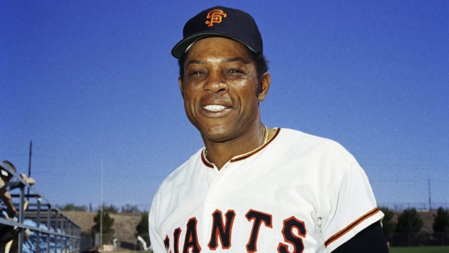 Willie Mays smiles in a photo wearing his San Francisco Giants uniform.