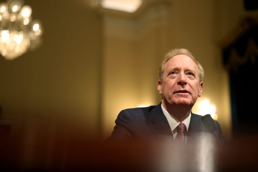 Microsoft President Brad Smith is seen at a congressional hearing.