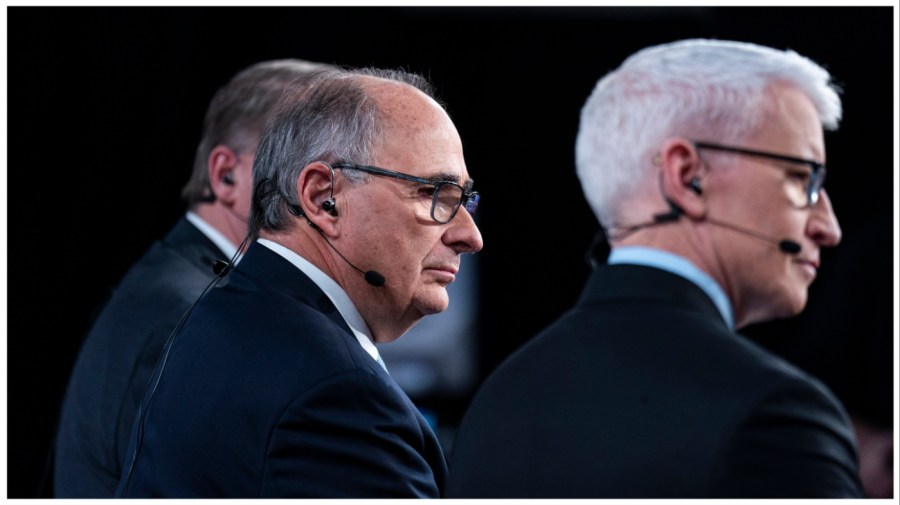 David Axelrod, senior political commentator at CNN and former senior advisor to former US President Barack Obama, left, and Anderson Cooper, anchor for CNN, in the media spin room following the Republican primary presidential debate hosted by CNN in Des Moines, Iowa, US, on Wednesday, Jan. 10, 2024. (Al Drago/Bloomberg via Getty Images)