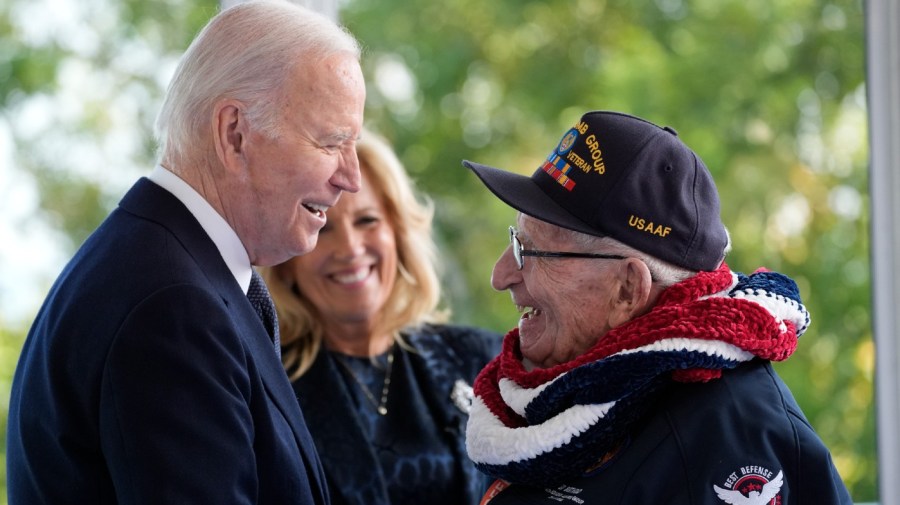 President Joe Biden and first lady Jill Biden, greet a World War II veteran during ceremonies to mark the 80th anniversary of D-Day, Thursday, June 6, 2024, in Normandy.