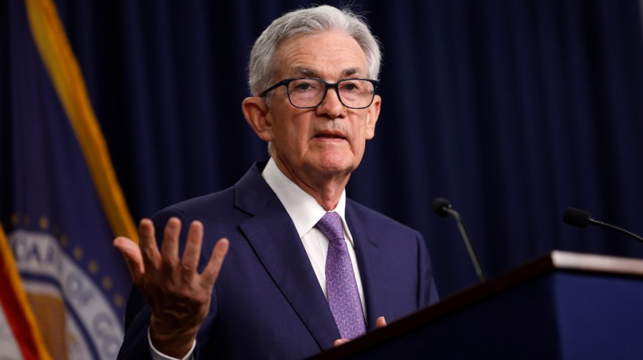 Federal Reserve Chair Jerome Powell gestures while speaking.