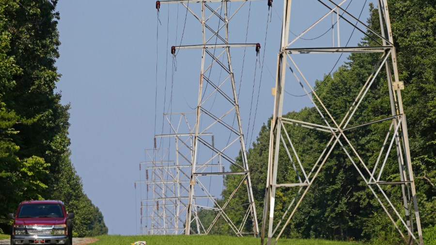 Power transmission lines deliver electricity to rural Orange County on Aug. 14, 2018, near Hillsborough, N.C. (AP Photo/Gerry Broome, File)