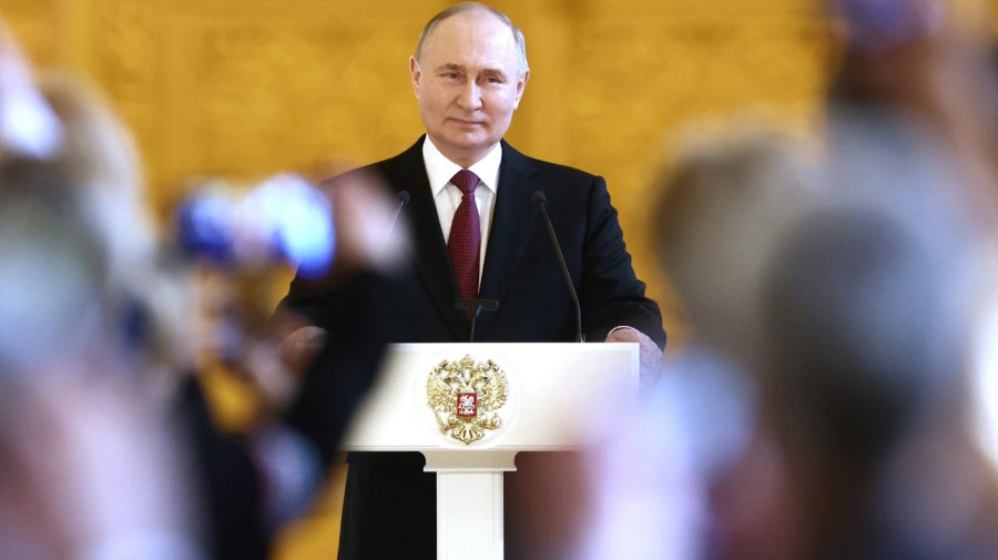 In this pool photograph distributed by Russia's state agency Sputnik, Russian President and presidential candidate Vladimir Putin meets with his election agents at the Kremlin in Moscow on March 20, 2024. Vladimir Putin won over 87 percent of the vote in a three-day ballot past weekend that included voting in parts of Ukraine held by Russian forces. (Photo by Valery SHARIFULIN / POOL / AFP) (Photo by VALERY SHARIFULIN/POOL/AFP via Getty Images)