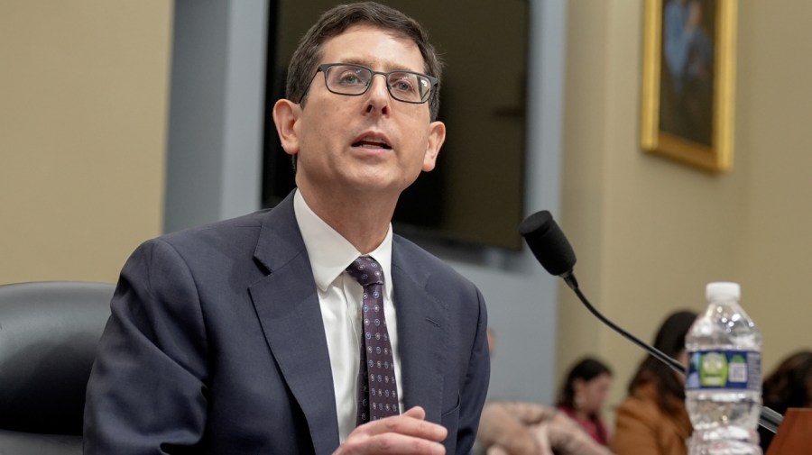 Phillip Swagel, Director of the Congressional Budget Office, testifies during a House Committee hearing on the Congressional Budget Office's budget and economic Outlook, Wednesday, Feb. 14, 2024, on Capitol Hill, in Washington. (AP Photo/Mariam Zuhaib)