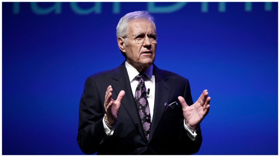 In this Oct. 1, 2018, file photo, moderator Alex Trebek speaks in Hershey, Pa. (AP Photo/Matt Rourke, File)