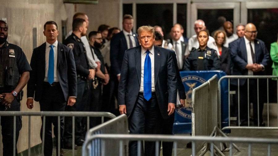 Former President Donald Trump walks out of court and toward the media following the verdict in his hush money trial, in New York, Thursday, May 30, 2024.