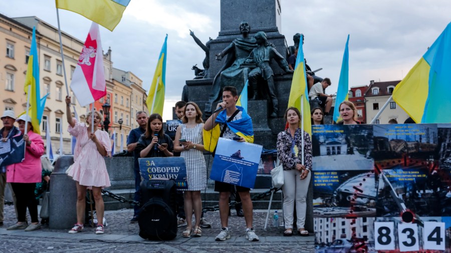 Members of Ukrainian diaspora sing during a daily demonstration of solidarity with Ukraine on the Main Square in Old Town of Krakow, Poland on the 834. day of Russian invasion on June 6, 2024. Ukrainians living in Krakow and supporters gather every day to demonstrate. (Photo by Dominika Zarzycka/NurPhoto via Getty Images)