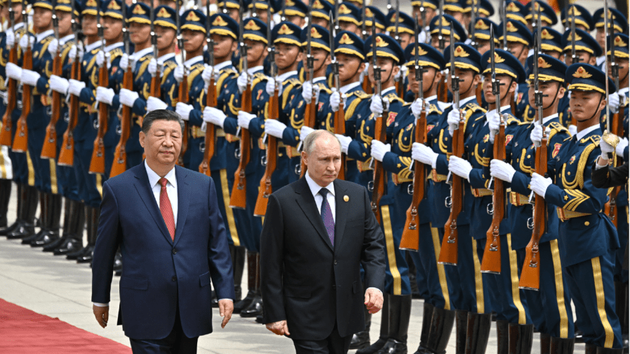 In this pool photograph distributed by the Russian state agency Sputnik, Russia's President Vladimir Putin and China's President Xi Jinping attend an official welcoming ceremony in front of the Great Hall of the People in Tiananmen Square in Beijing on May 16, 2024. Photo by SERGEI BOBYLYOV/POOL/AFP via Getty Images)