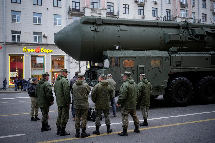 FILE - Soldiers stand next to a Russian RS-24 Yars ballistic missile parked along Tverskaya street prior to a rehearsal for the Victory Day military parade in Moscow, on Thursday, May 2, 2024. (AP Photo/Alexander Zemlianichenko, File)