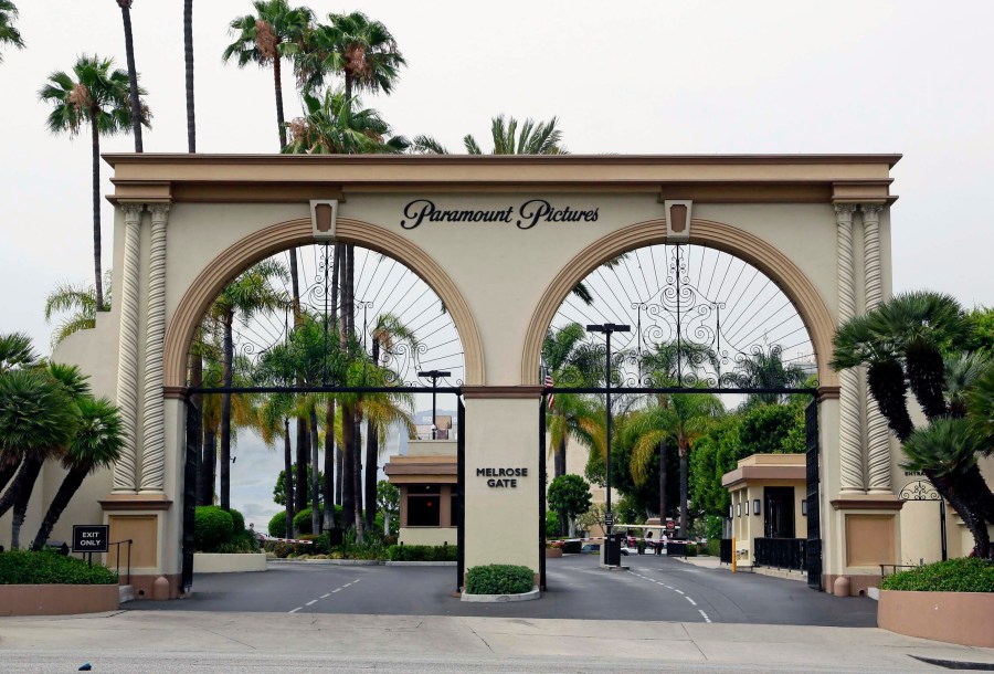 FILE - The main gate to Paramount Studios is seen on Melrose Avenue, July 8, 2015, in Los Angeles. Entertainment giant Paramount has agreed to merge with Skydance, a deal that will hand over control of the company that owns CBS and the studio behind blockbuster films such “Top Gun″ and ”The Godfather." The new combined company is valued at around $28 billion. (AP Photo/Nick Ut, File)