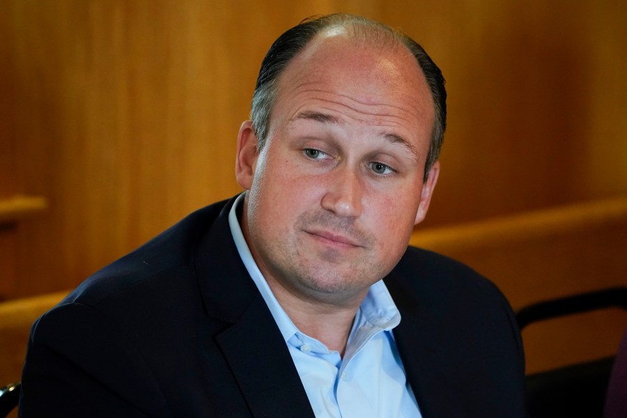 FILE - Nick Langworthy, chair of the New York State Republican Committee, listens to supporters in Elmira, N.Y., Aug. 22, 2022. House Republicans approved two bills Tuesday, July 9, 2024, rolling back Energy Department efficiency standards for home refrigerators and dishwashers. Rep. Langworthy, R-N.Y., would bar the administration from implementing or enforcing new efficiency rules if they are not "cost-effective or technologically feasible." (AP Photo/Seth Wenig, File)