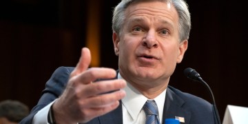 FILE - FBI Director Christopher Wray speaks during a hearing of the Senate Intelligence Committee on Capitol Hill, March 11, 2024, in Washington. Wray is set to testify about the bureau’s investigation into the attempted assassination of former President Donald Trump, with lawmakers at a congressional hearing likely to press him for fresh details about the gunman’s motive and background.(AP Photo/Mark Schiefelbein, File)