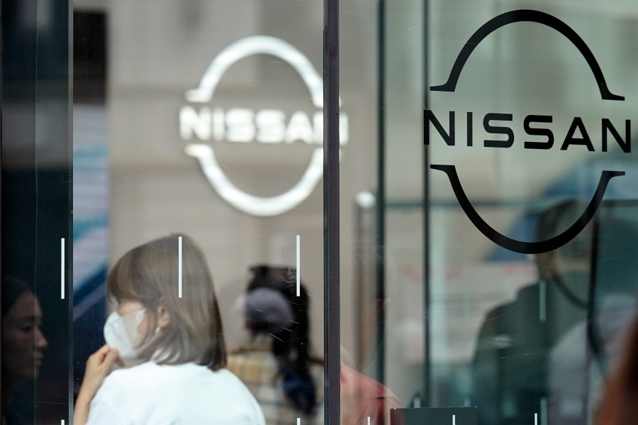 FILE - Logos at a Nissan showroom are seen in Ginza shopping district in Tokyo, March 31, 2023. (AP Photo/Eugene Hoshiko, File)