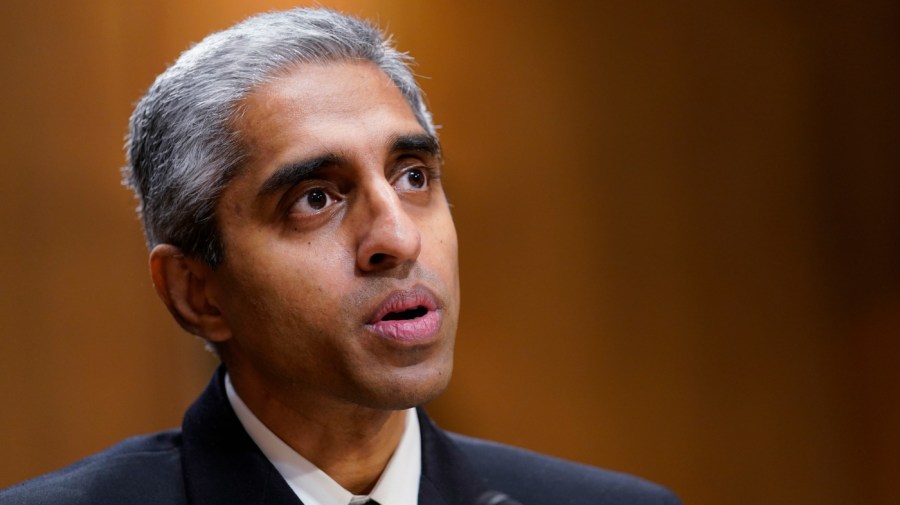 Surgeon General Dr. Vivek Murthy testifies before the Senate Finance Committee on Capitol Hill in Washington, on Feb. 8, 2022, on youth mental health care. Widespread loneliness in the U.S. is posing health risks as deadly as smoking a dozen cigarettes daily, costing the health industry billions of dollars annually, the U.S. surgeon general said Tuesday in declaring the latest public health epidemic. About half of U.S. adults say they’ve experienced loneliness, Murthy said in a new, 81-page report from his office. (AP Photo/Susan Walsh, File)