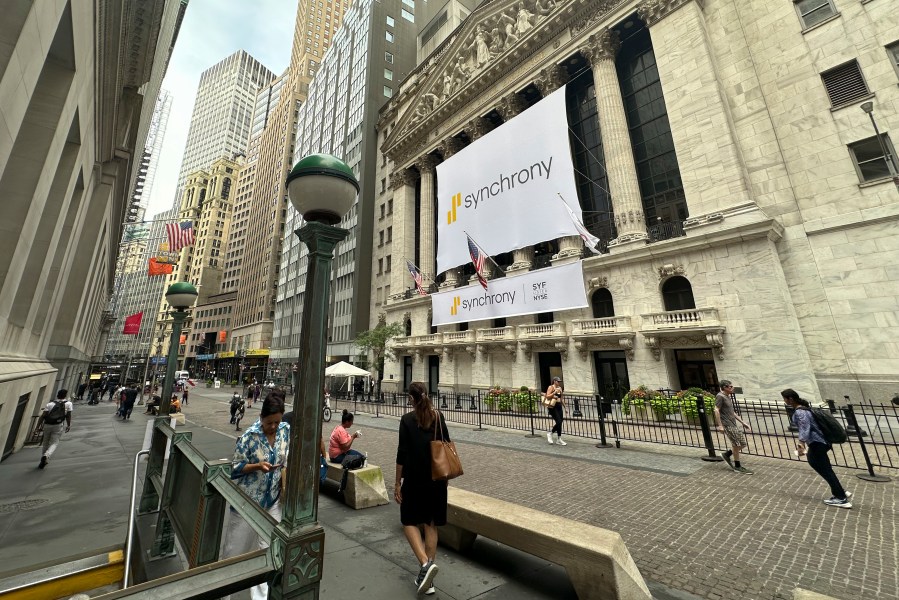 People pass the New York Stock Exchange on Wednesday, July 31, 2024 in New York. Global stocks have advanced and oil prices jumped more than $2 a barrel after Hamas's top political leader died in an air strike.(AP Photo/Peter Morgan)