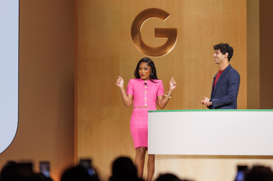 Actress Keke Palmer, left, surprises the audience on stage during Made By Google, alongside Alex Schiffhauer during an announcement of new products at Google on Tuesday, Aug. 13, 2024, in Mountain View, Calif. (AP Photo/Juliana Yamada)