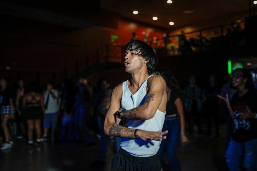 Dancer Francisco Piedra, known by stagename "Ken," dances to a K-pop, or popular Korean music, at a cultural house in Havana, Cuba, Saturday, Sept. 7, 2024. (AP Photo/Ramon Espinosa)