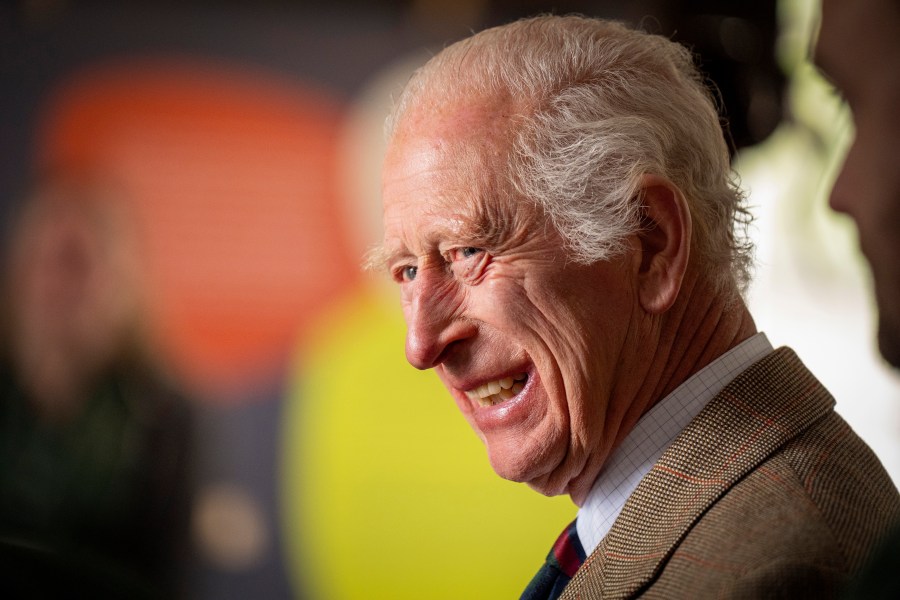 Britain's King Charles III smiles during his visit to the Forsinard Flows Visitor Centre in Forsinard, Highland, Scotland, July 31, 2024. (Jane Barlow/Pool Photo via AP, File)