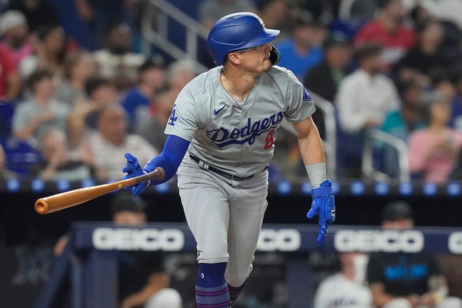 CORRECTS PLAYER TO KIKE HERNANDEZ INSTEAD OF TEOSCAR HERNANDEZ - Los Angeles Dodgers' Kiké Hernández (8) hits a three-run home run during the fourth inning of a baseball game against the Miami Marlins, Wednesday, Sept. 18, 2024, in Miami. (AP Photo/Marta Lavandier)