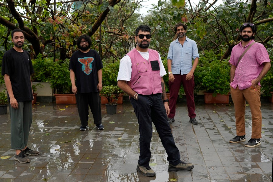 From left, Rohit Gupta, Kartik Pillai, Karan Singh, Suryakant Sawhney, and Dhruv Bhola of Peter Cat Recording Co. pose for a photograph in Mumbai, India, Friday, Aug. 2, 2024. (AP Photo/Rajanish Kakade)