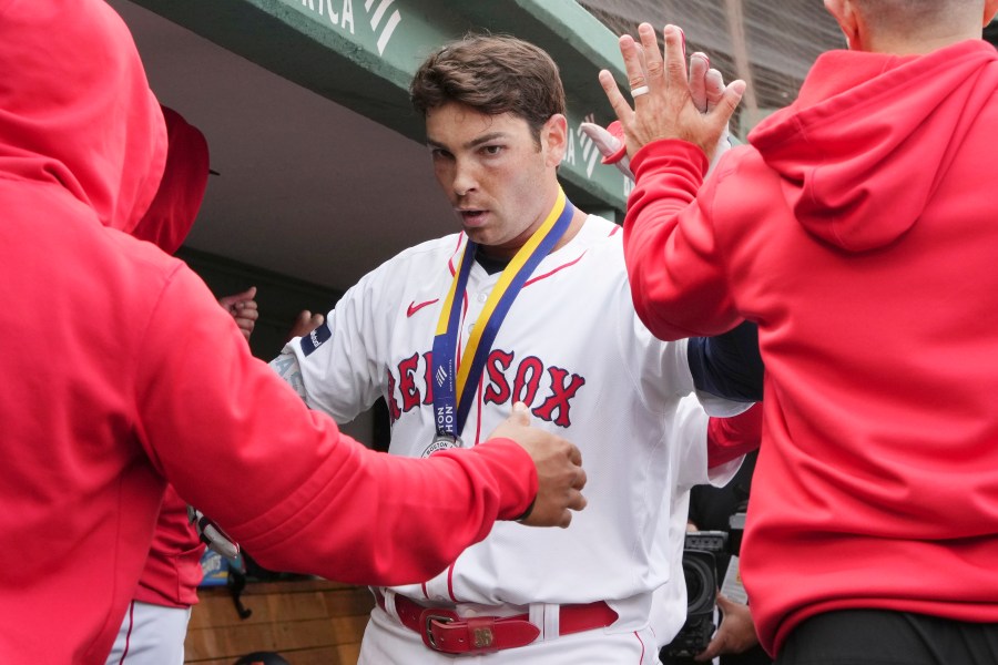 Boston Red Sox's Triston Casas celebrates after his three-run home run during the third inning of the first game of a baseball doubleheader against the Minnesota Twins, Sunday, Sept. 22, 2024, in Boston. (AP Photo/Michael Dwyer)