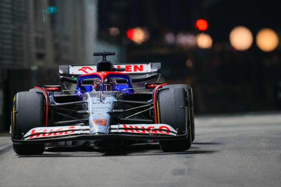 RB driver Daniel Ricciardo of Australia steers his car during the Singapore Formula One Grand Prix at the Marina Bay Street Circuit, in Singapore, Sunday, Sept. 22, 2024. (AP Photo/Vincent Thian)