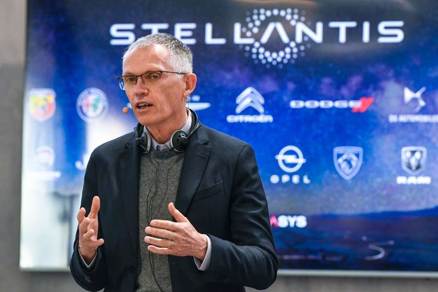 FILE - Stellantis CEO Carlos Tavares speaks during a news conference following a meeting with unions, March 31, 2022, in Turin, Italy. (Fabio Ferrari/LaPresse via AP, File)