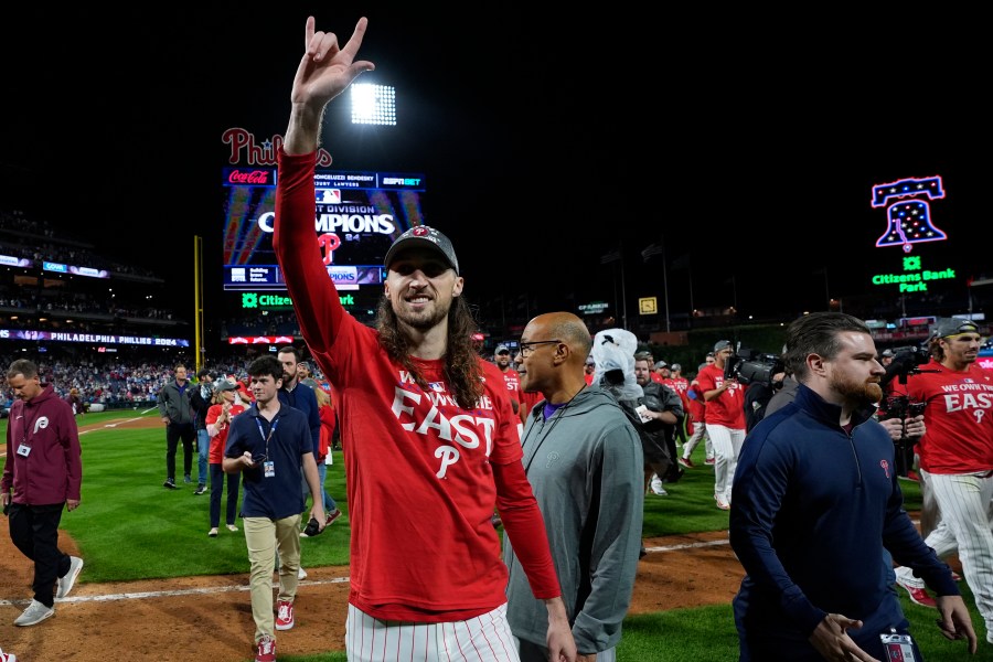 Philadelphia Phillies' Matt Strahm celebrates after winning a baseball game against the Chicago Cubs to clinch the NL East title, Monday, Sept. 23, 2024, in Philadelphia. (AP Photo/Matt Slocum)